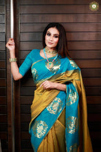 Load image into Gallery viewer, Captivating Mustard Yellow Color Soft Banarasi Silk Saree With Stunning Blouse Piece