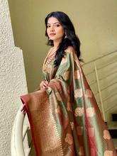 Load image into Gallery viewer, Kala Niketan Green Smooth Silk Saree With Golden Zari Border
